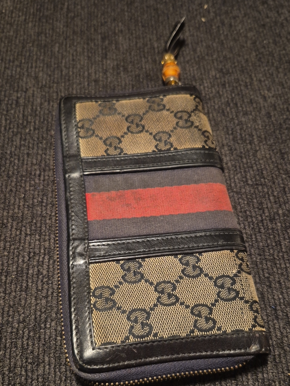 Gucci Brown Monogram Zip Wallet with Black Trim and Red Stripe